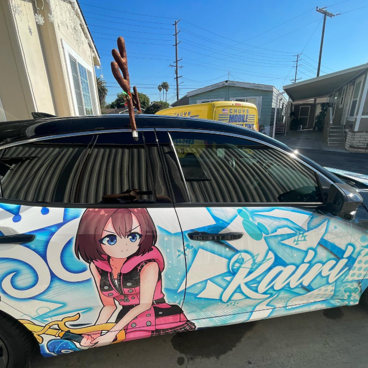 A car with a picture of a girl and the word kairi on it