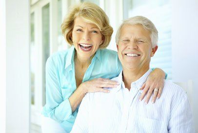Root Canals — Senior Couple Smiling in Wilmington, NC