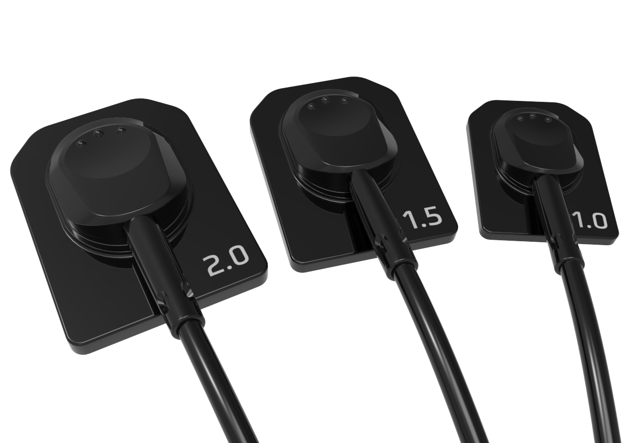 A close up of four black sensors with numbers on them on a white background.