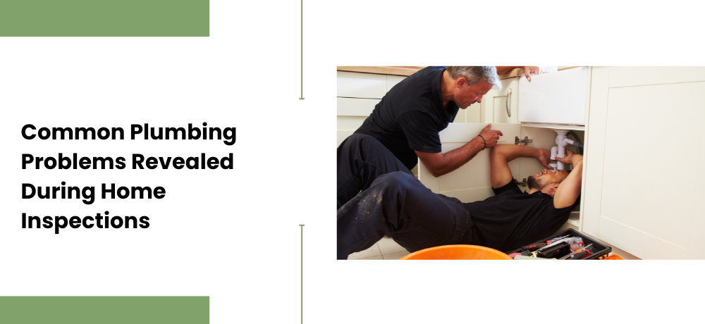 Two men working on plumbing under a kitchen sink.