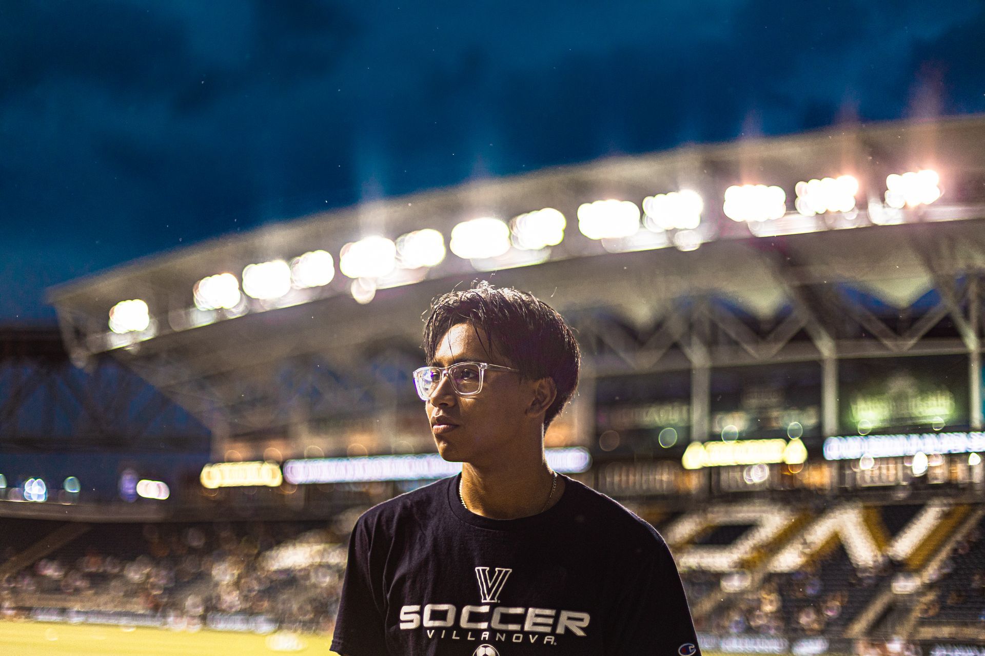 A person wearing glasses and a 