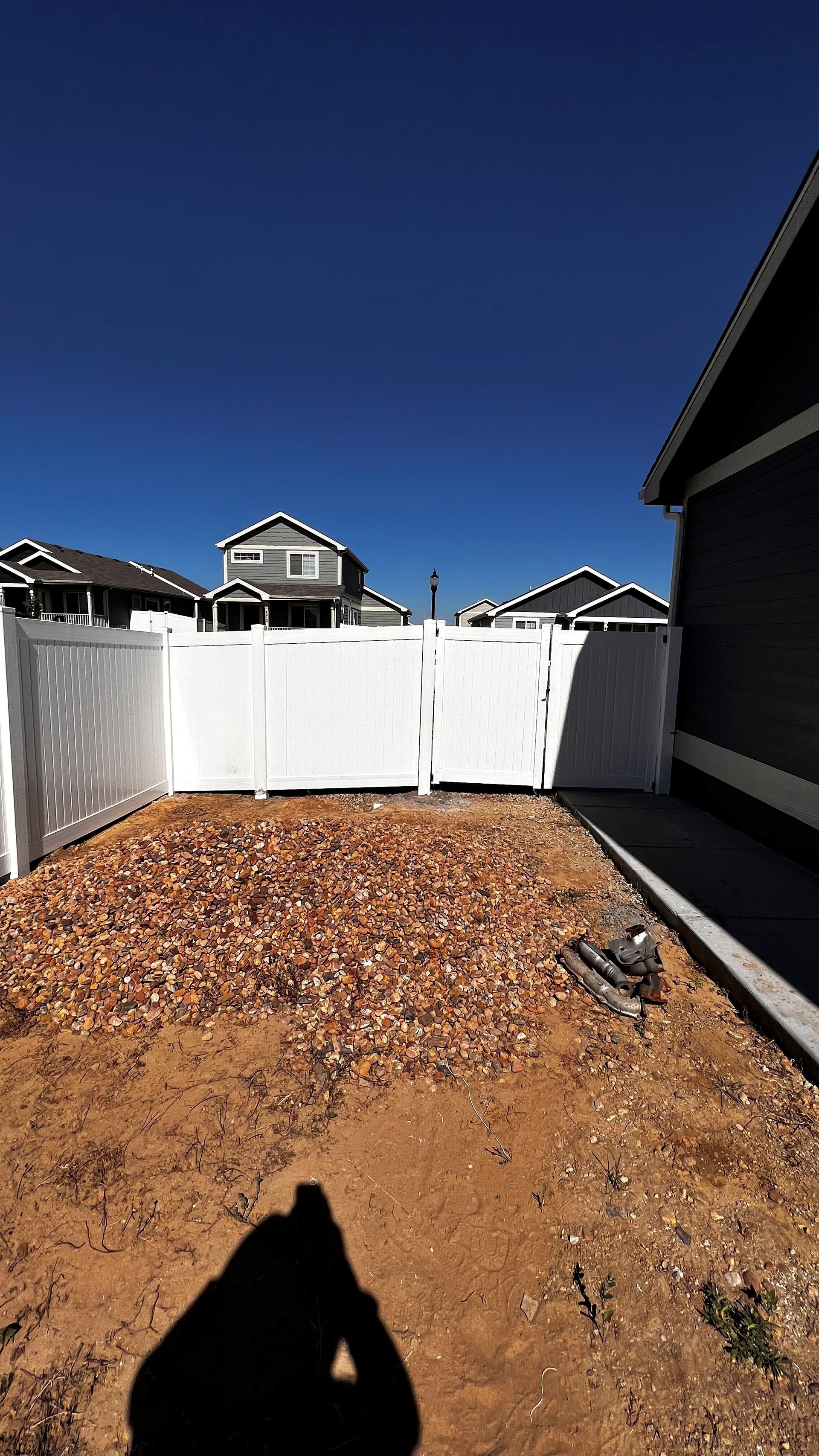 Viynl privacy fence — Greeley, CO — Fence Pros