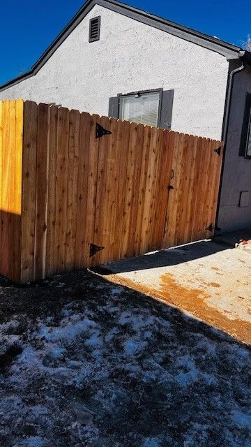 Cedar privacy fence with double gate — Greeley, CO — Fence Pros