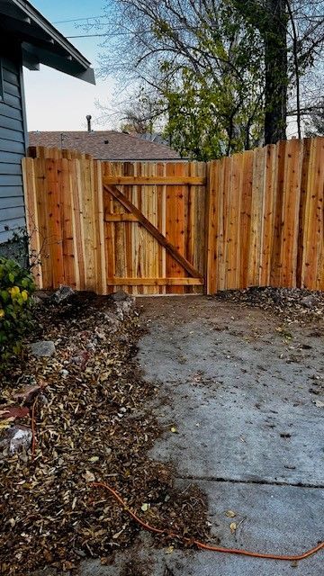 Wing wall fence with gate — Greeley, CO — Fence Pros