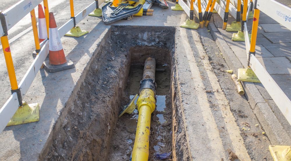 A Trench Dug in Asphalt Reveals a Yellow Gas Pipe — ALI Civil Pty Ltd in South Nowra, NSW