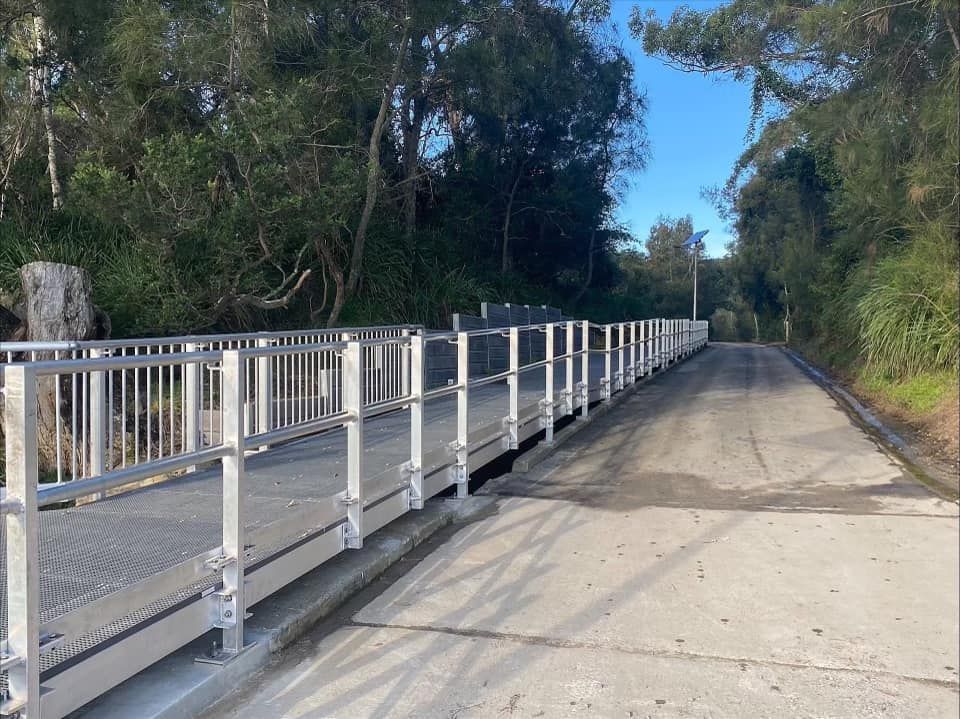 Bridge With Metal Railings Over a Water Passage — ALI Civil Pty Ltd in South Ulladulla, NSW
