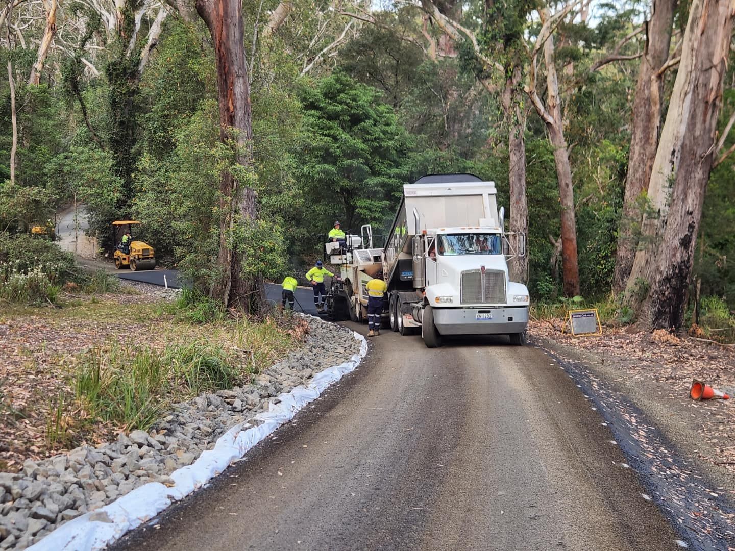 Truck Unloading Asphalt on a Narrow Road — ALI Civil Pty Ltd in South Nowra, NSW