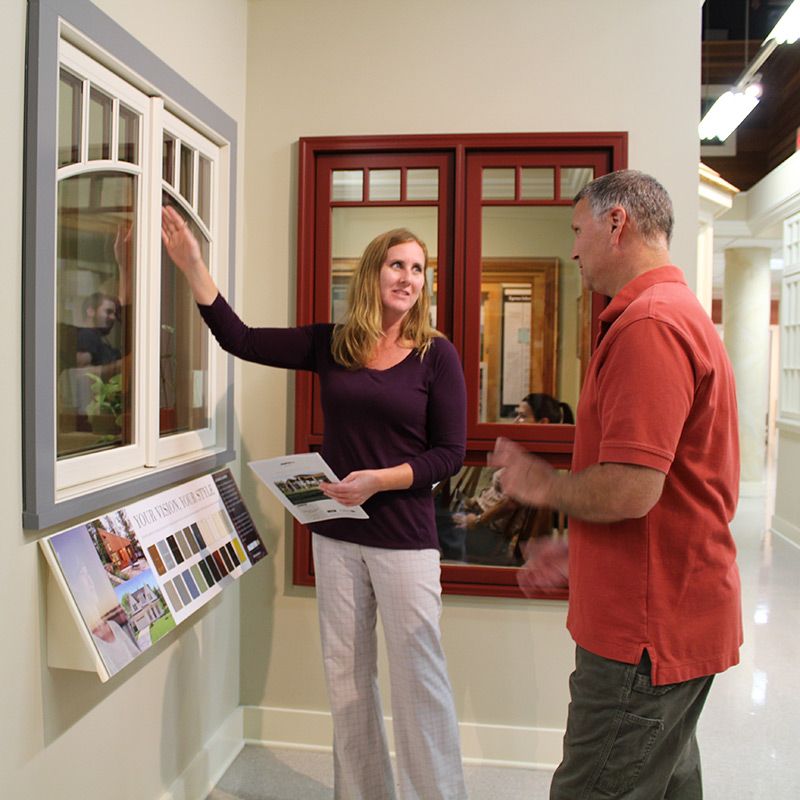 Two people discussing windows