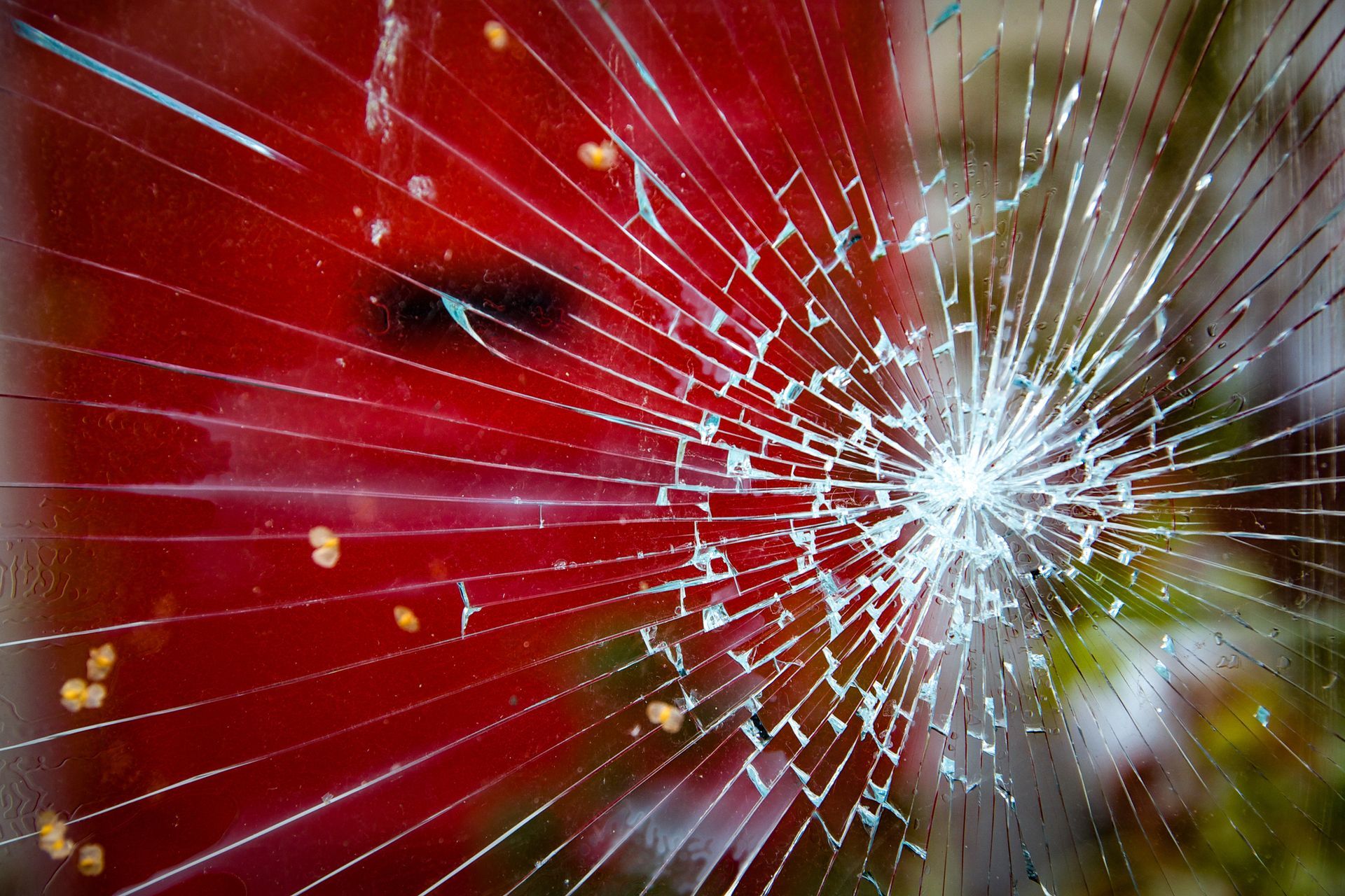 Broken Window with a Red Background