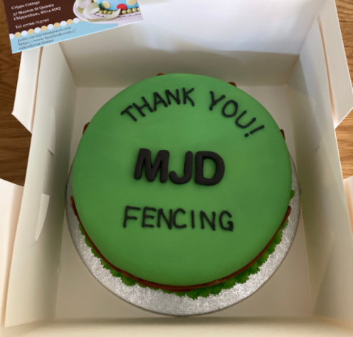 A green cake that says thank you mjd fencing