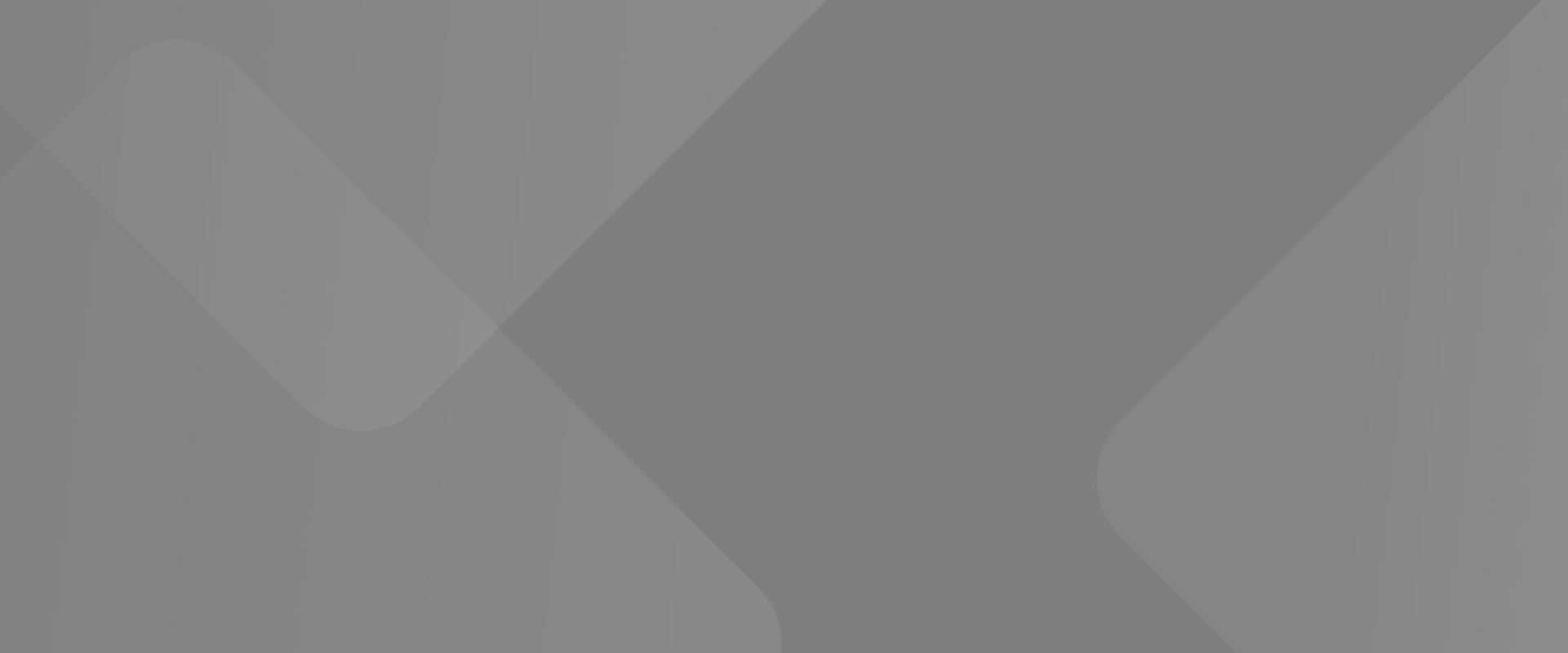 Un gros plan d'un fond gris avec un motif géométrique.