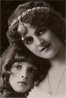 One of the earliest available images of Gladys on a postcard is as a child alongside Marie Studholme. www.gladyscooper.com
