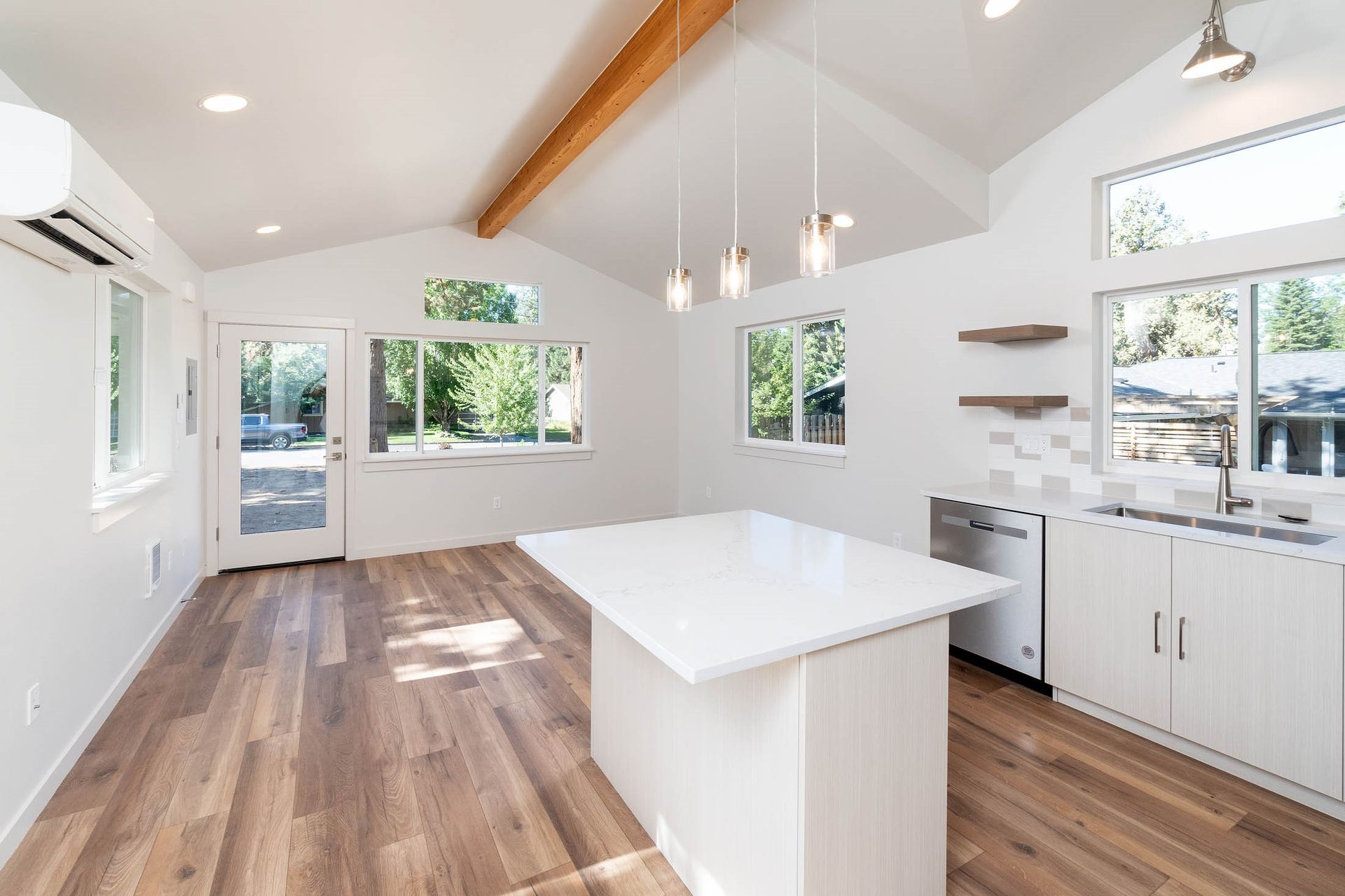There is a large island in the middle of the kitchen.