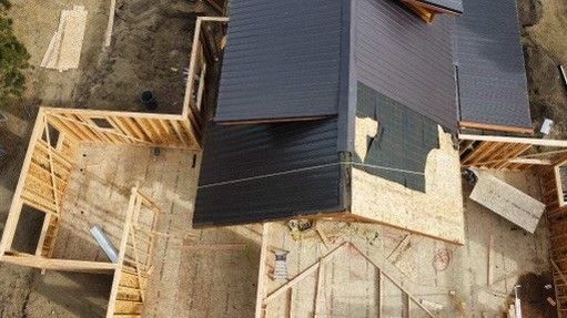 An aerial view of a house under construction.