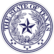 The seal of the state of Texas with a star and leaves