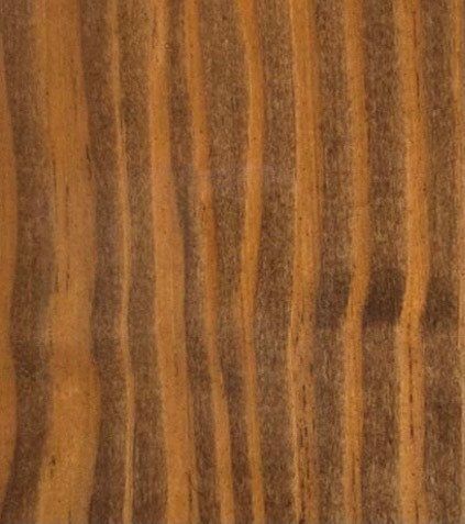 A close up of a piece of wood showing the grain and texture.