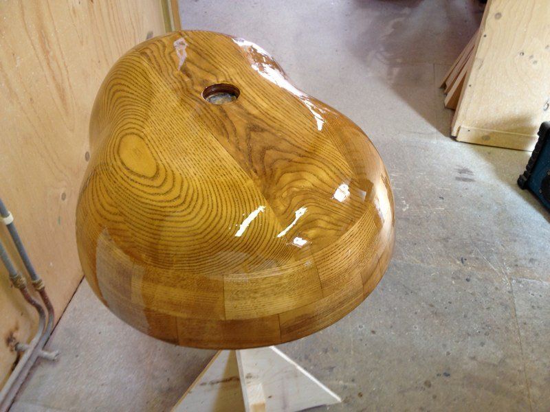 A large wooden object with a hole in the middle