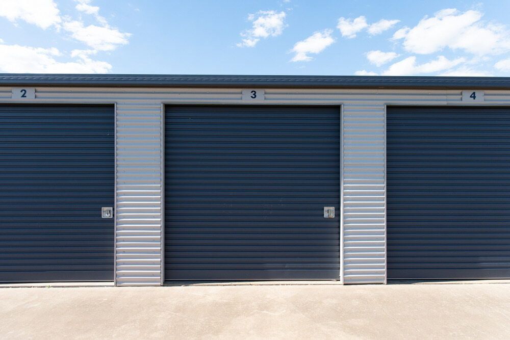 Storage Units With Dark Gray Doors — ShedBoss in Millaa Millaa, QLD