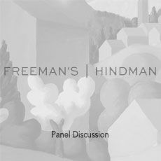 A black and white photo of a panel discussion on freeman 's hindman.