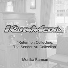 A black and white photo of a person standing in a living room.