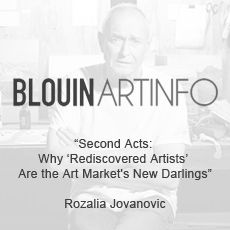 A black and white photo of a man sitting in a chair.