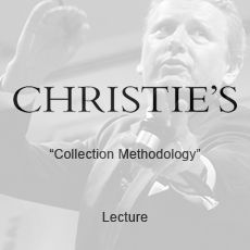 A black and white photo of a man in a suit and tie holding a microphone.