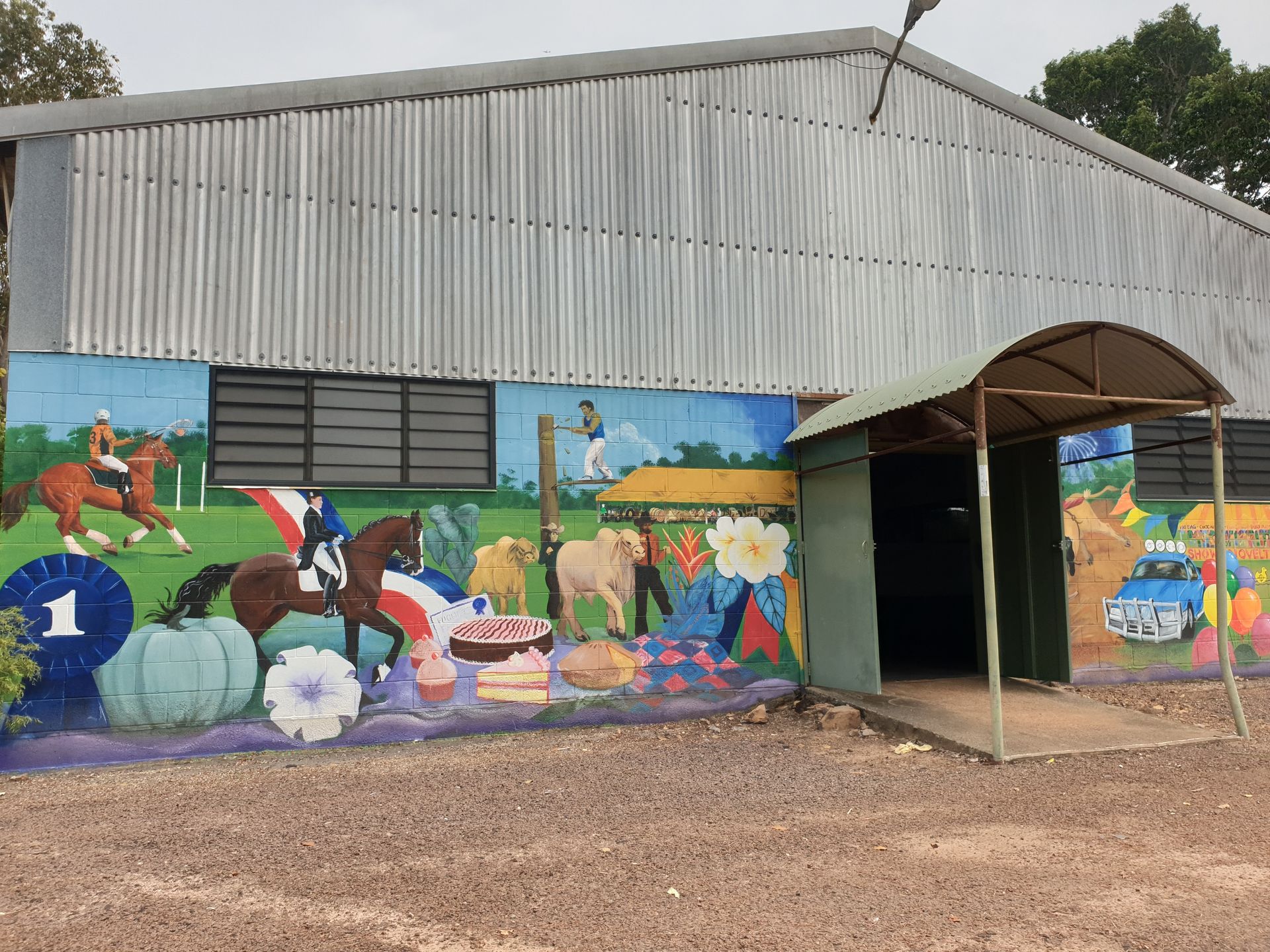 A building with a large mural on the side of it