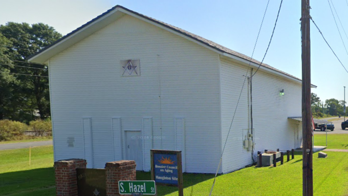 White building with sign
