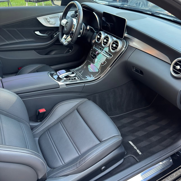 Black Bentley car being foamed with soap at a car wash - At Lux Detailing Winnipeg
