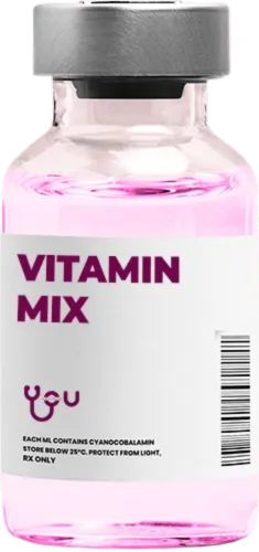 A bottle of vitamin mix with a pink liquid in it. | You Health