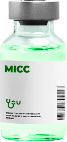 A bottle of green liquid with a label that says micc on it | You Health