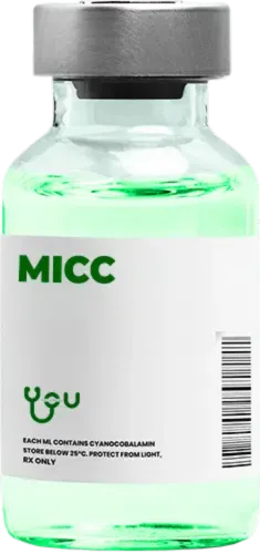 A bottle of green liquid with a label that says micc on it | You Health