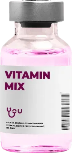 A bottle of vitamin mix with a pink liquid in it. | You Health