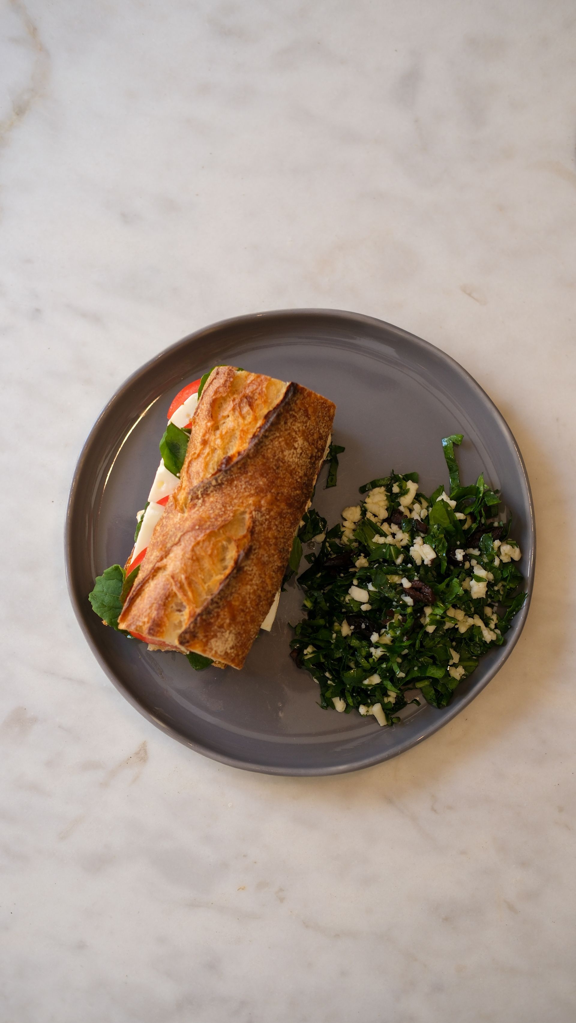 <b>smoked cold sandwich</b><br>Smoked turkey, goat cheese, arugula, tomatoes