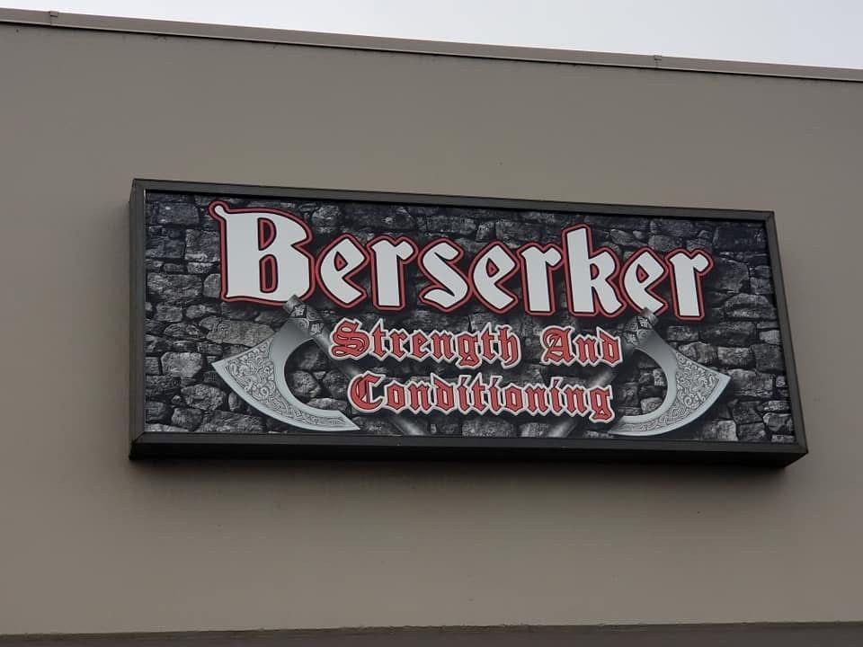 A sign on the side of a building that says berserker