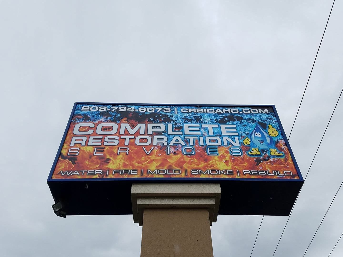 A large billboard for complete restoration services