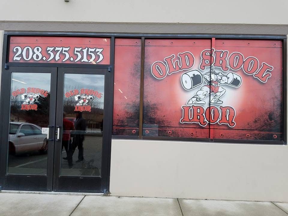 A store front with a phone number on it