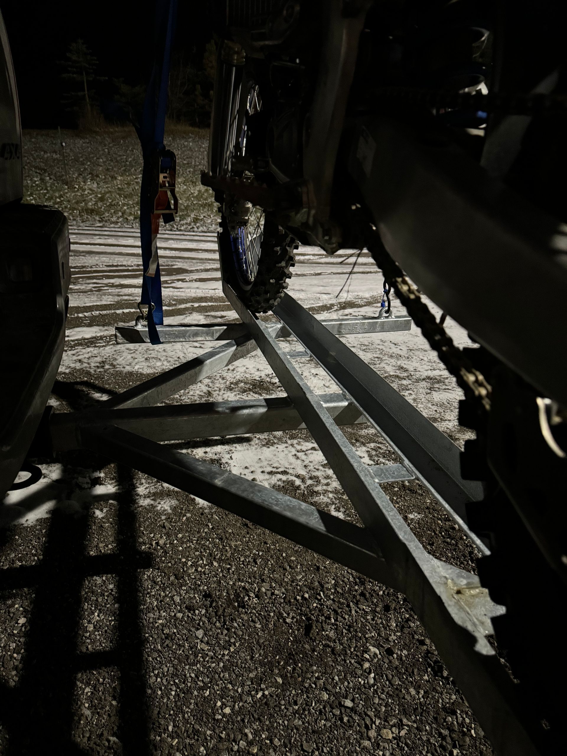 A close up of a motorcycle on a ramp