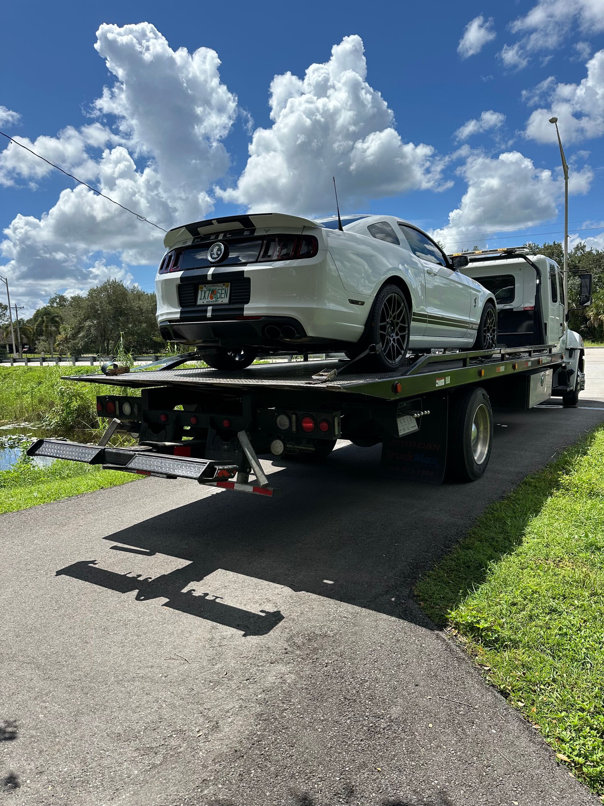 Ford Mustang towing service in Miami-Dade – flatbed transport for luxury and performance vehicles.