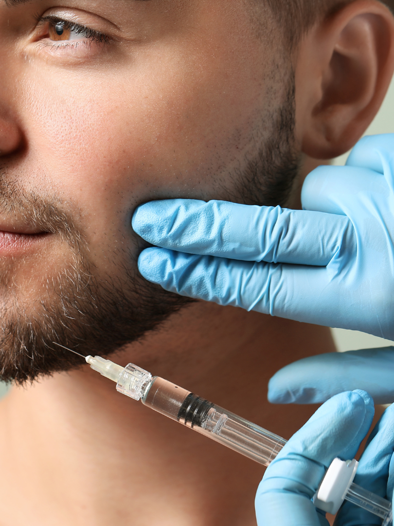 A woman is getting her teeth whitened at the diamond dental studio