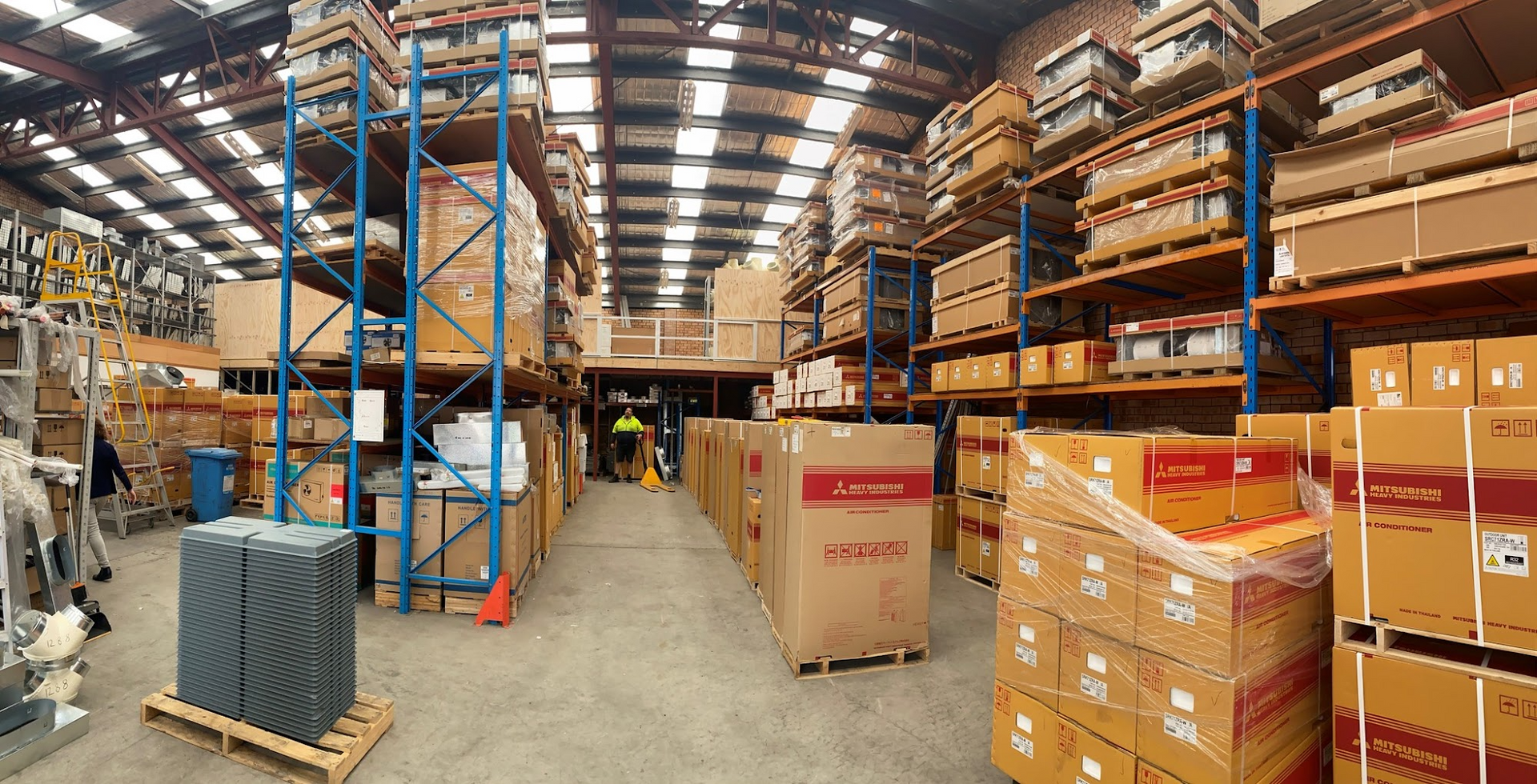 Warehouse Interior With High Shelves — Refrigeration & Air Supplies (South Coast) In Wollongong, NSW