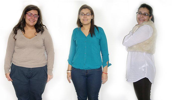 Tres mujeres están paradas una al lado de la otra con los brazos cruzados.