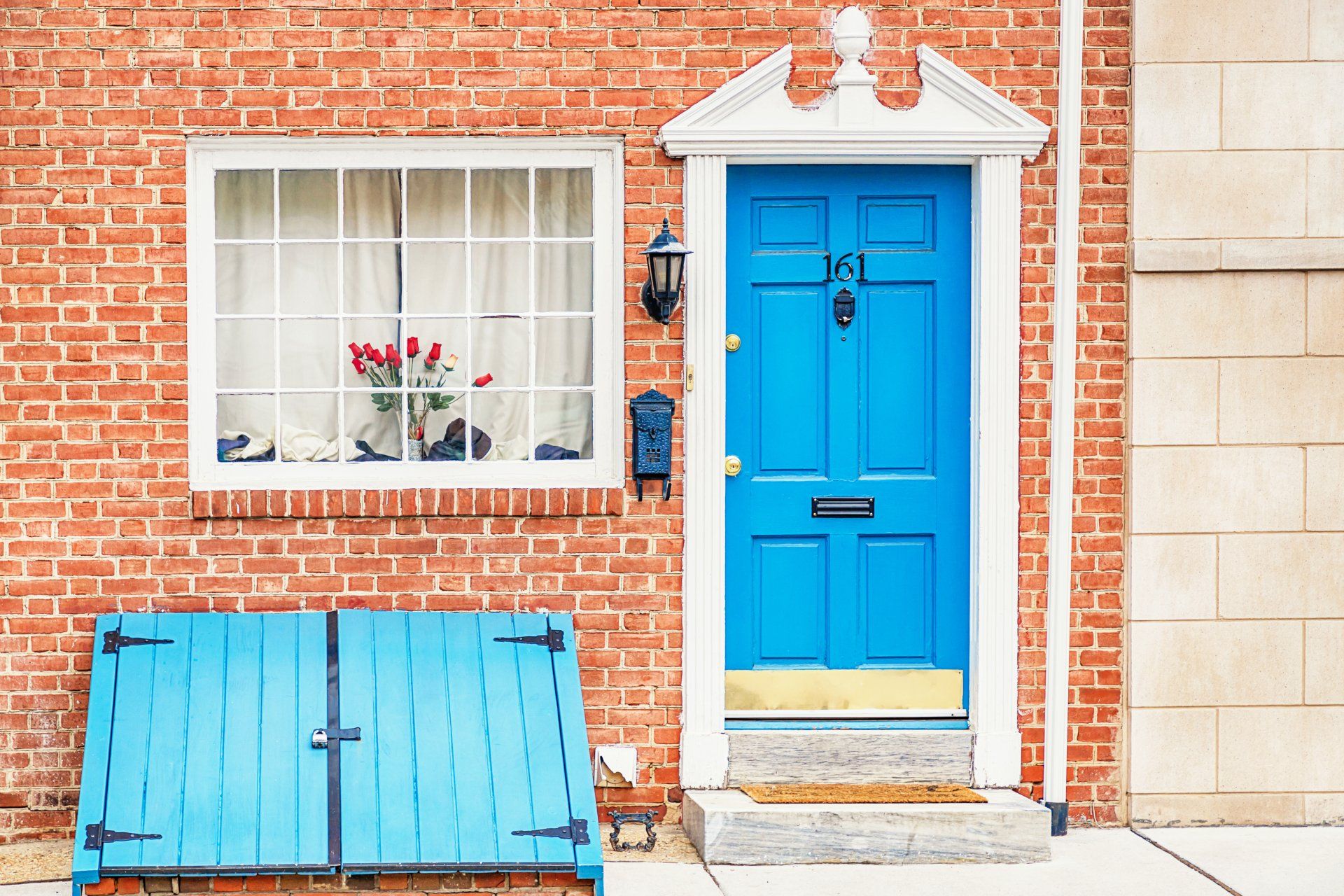 philadelphia brick home with blue door
