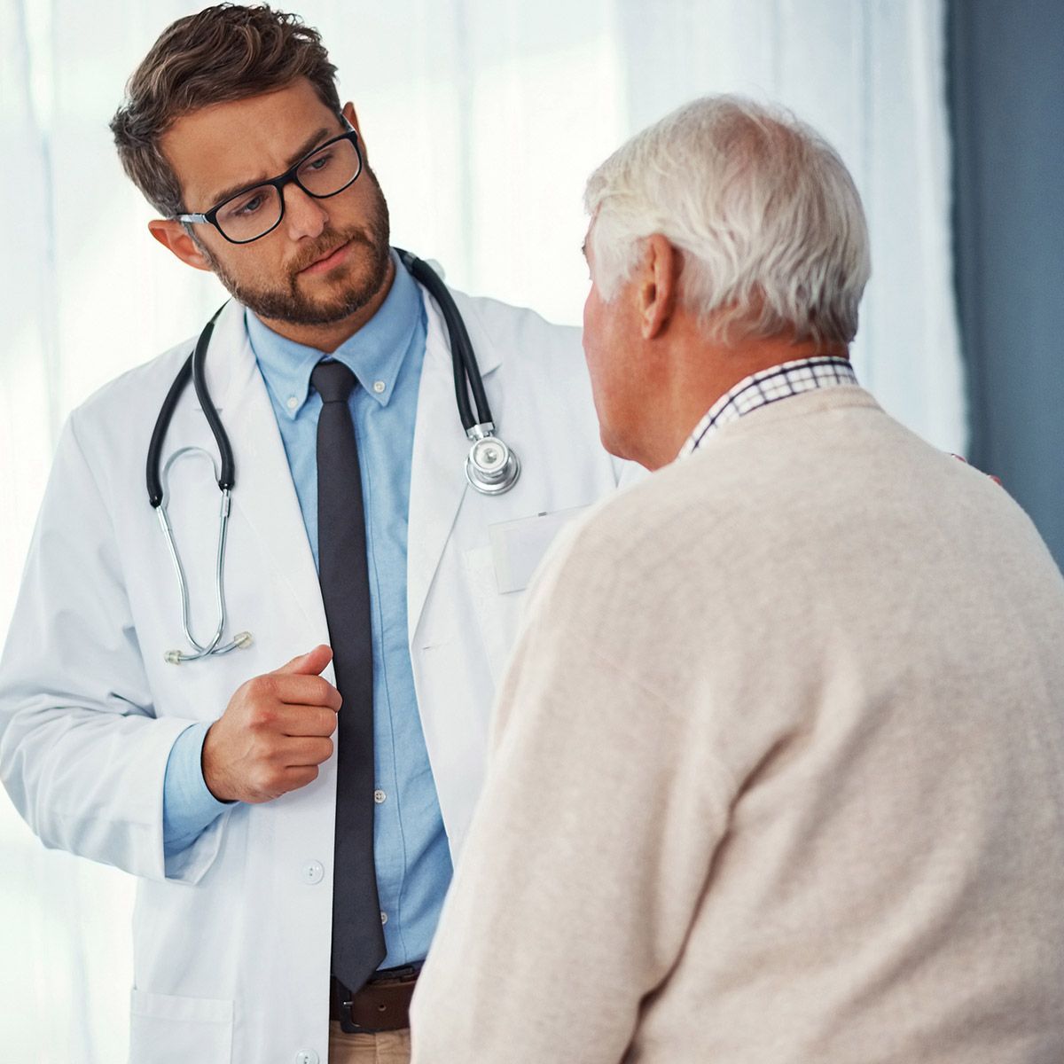 Doctor Examining a Senior Patient — Hollywood, FL — John Galt Insurance
