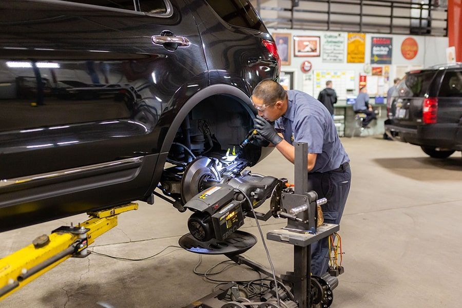Our Technician Inspects Brakes in Albany, OR | Crabtree Automotive
