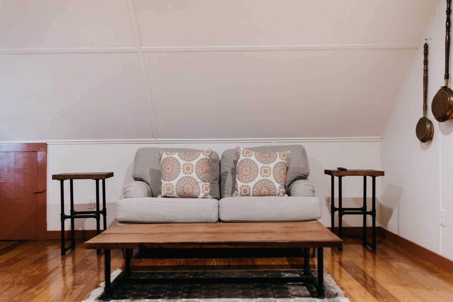 There is a couch and a coffee table in the living room.