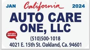 Auto Care One, LLC sign, January 2024, with phone, address, and Spanish speaking sign.