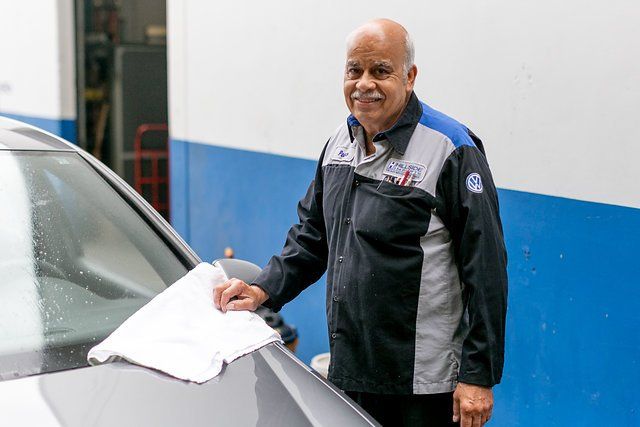 Man Cleaning Car — Portland, OR — Hillside Imports