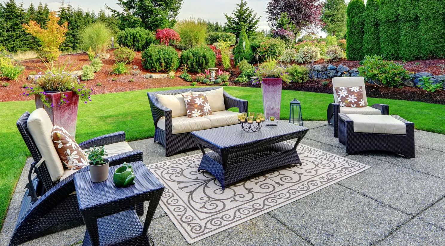 Patio with hedges and new landscaping