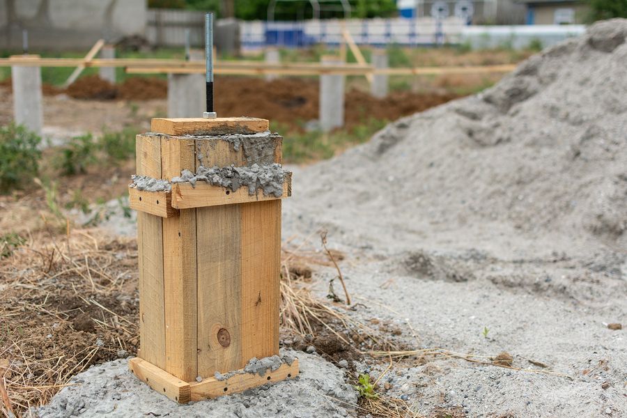 a construction site with a concrete slab and scaffolding